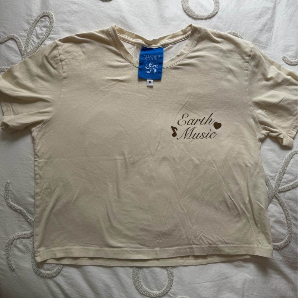 All caps studio Earth Music shirt